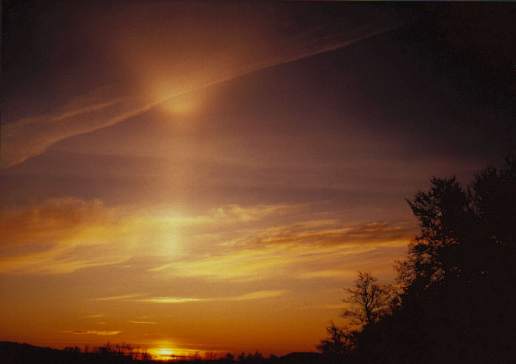 Sun pillar with upper tangent arc.